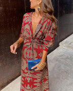 Women's boho maxi dress with V-neckline and twist front detail, full-length boho print