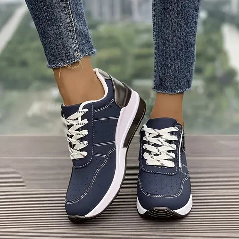 Orthopedic sneakers with height boosting cushioned sole and arch support