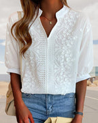 Women's white V-neck blouse with puff sleeves and patchwork detail, cotton-lace blend