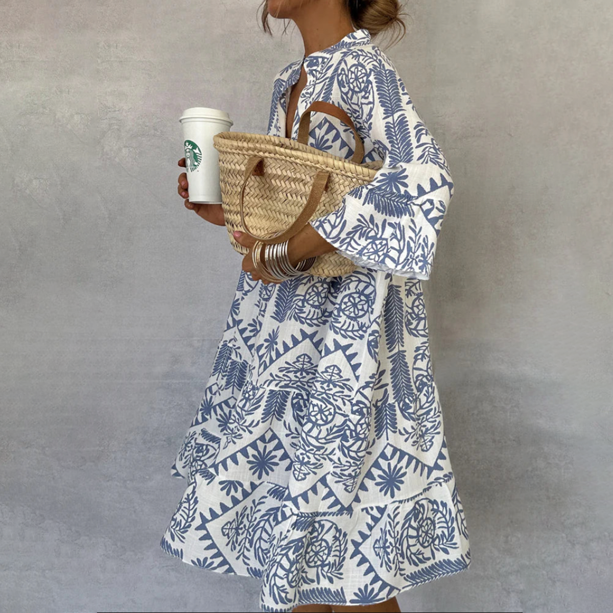 Women's white bohemian floral maxi dress with V-neckline, lightweight summer style