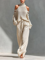 Women 2 Piece Off Shoulder Wide Leg Pants Set in beige flowing fabric