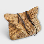 Women woven straw shoulder bag with firm top handle in natural texture