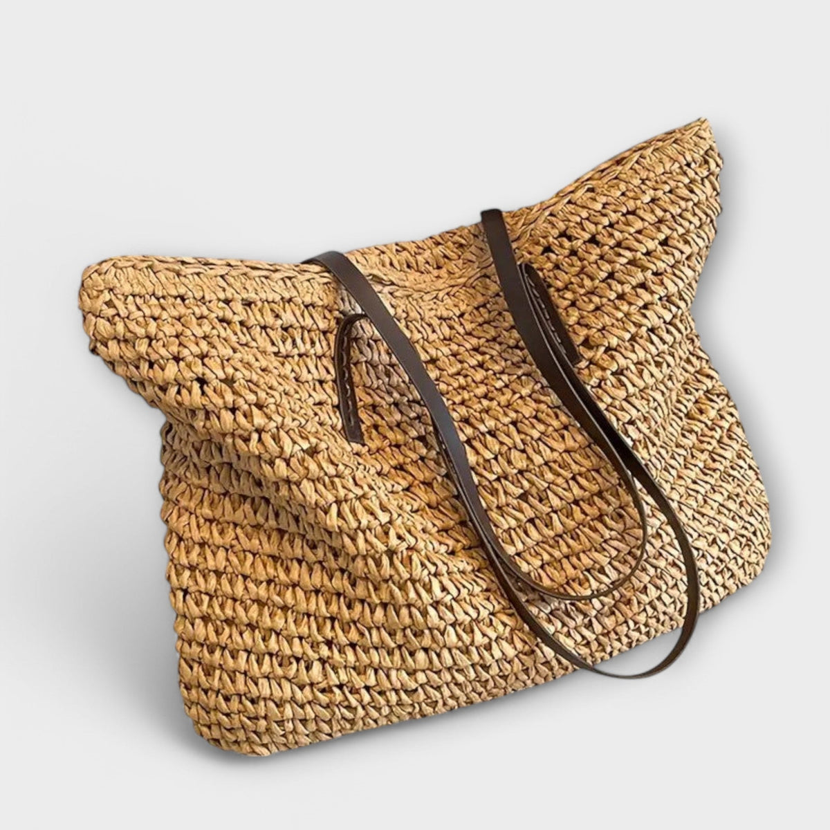 Women woven straw shoulder bag with firm top handle in natural texture