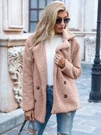 Women's mid-length coat with classic lapel collar, tailored fit outerwear