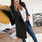 Women's long button-up coat with side pockets, elegant elongated silhouette
