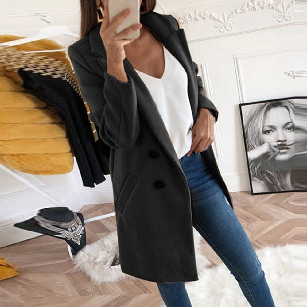 Women's long button-up coat with side pockets, elegant elongated silhouette