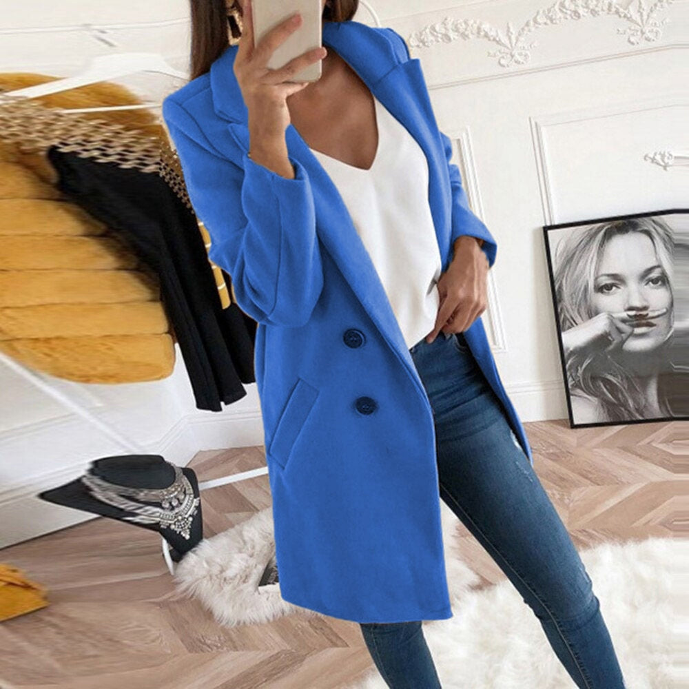 Women's long button-up coat with side pockets, elegant elongated silhouette
