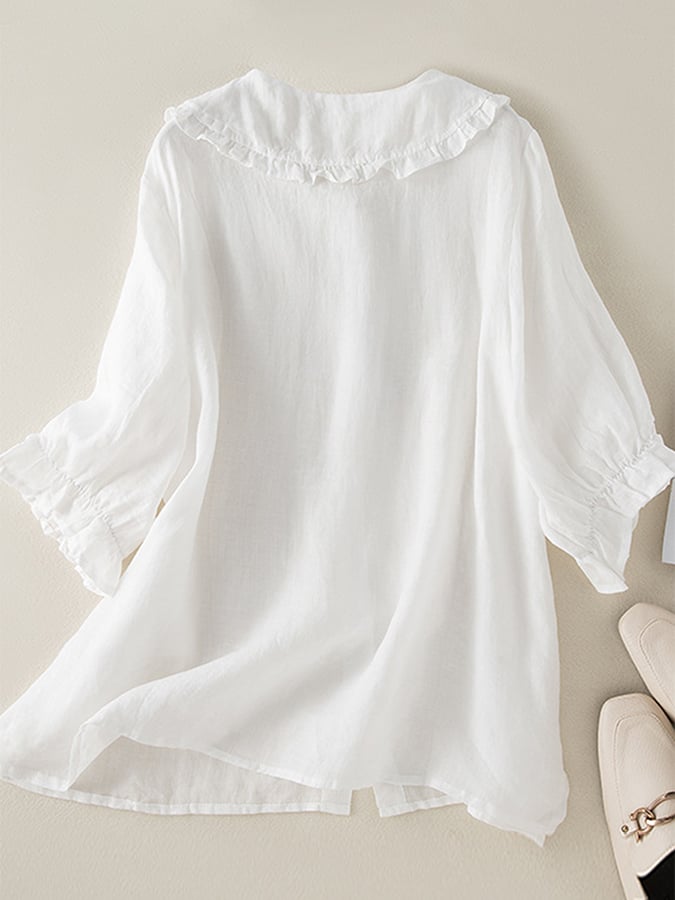 Women's lightweight ruffle collar blouse with button-front closure, elegant and feminine