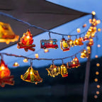 LED camping string lights with warm white tent and camper figures, battery operated