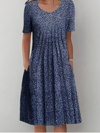 Women pleated floral midi dress with side pockets in soft-touch fabric