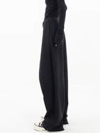 Women wide leg trousers asymmetric button detail in black and grey