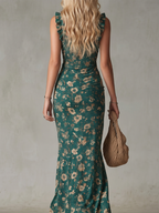 Dark green midi dress with smocked bodice, ruffle straps and front slit