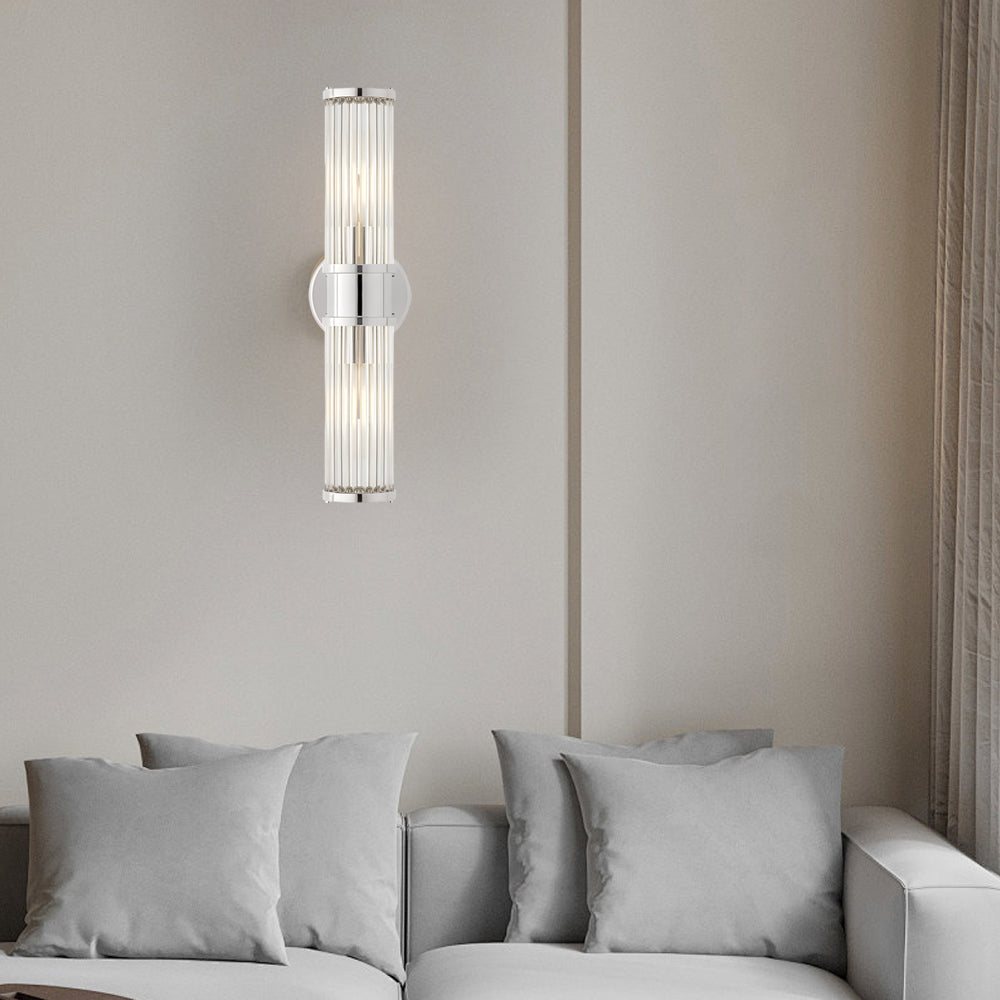 Modern wall lamp with cylindrical ribbed clear glass shade in chrome or gold finish