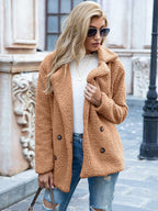 Women's mid-length coat with classic lapel collar, tailored fit outerwear