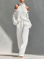 Women 2 Piece Off Shoulder Wide Leg Pants Set in beige flowing fabric