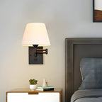 Swing arm wall lamp plug-in with linen shade and black iron frame, 1-light