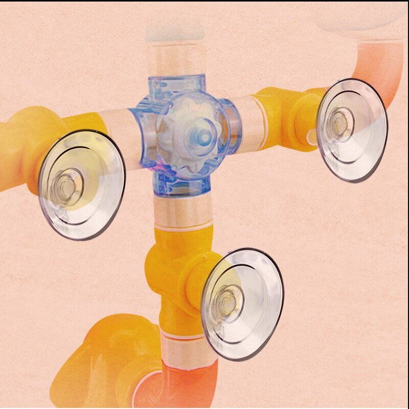 Bath toy sprinkler set with octopus, whale and crab figures with suction cups