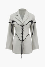 Women's blazer and corset two-piece set with lace-up detail, tailored silhouette