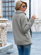 Women's mid-length coat with classic lapel collar, tailored fit outerwear