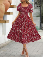 Women's floral mini dress with puff sleeves and tied waist, summer style
