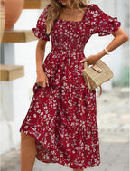 Women's floral mini dress with puff sleeves and tied waist, summer style