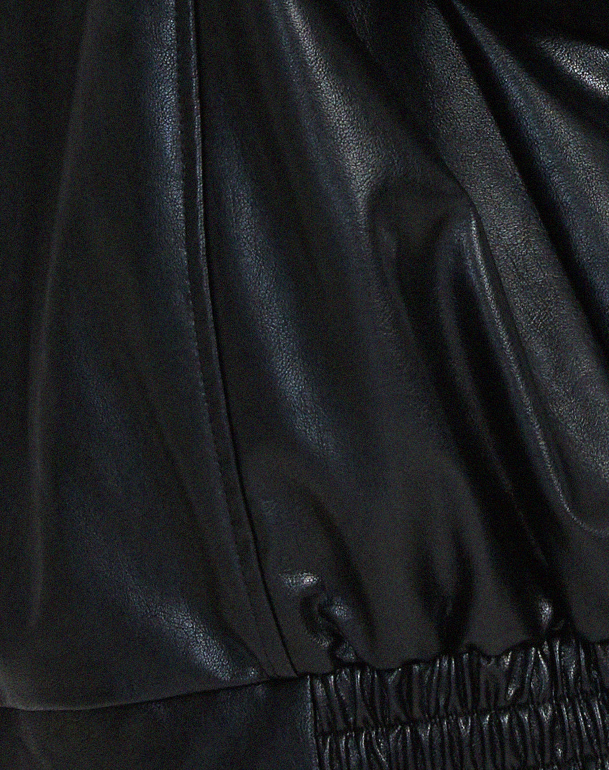 Women's oversized PU leather jacket in brown and black, relaxed fit streetwear style