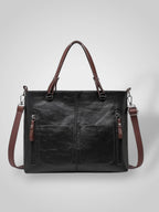 Women leather shoulder bag with magnetic snap closure and adjustable strap