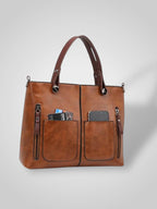 Women leather shoulder bag with magnetic snap closure and adjustable strap