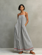 Women's striped maxi dress with spaghetti straps and red trim detail