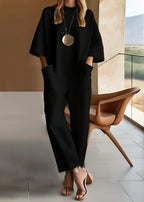 Women relaxed fit jumpsuit round neck long sleeve in black and white