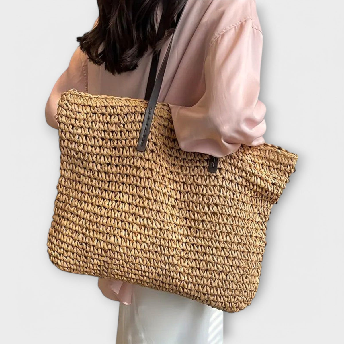 Women woven straw shoulder bag with firm top handle in natural texture