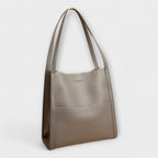 Structured handbag women's shoulder bag with zip top and tassel detail