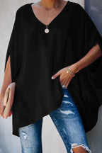 Women oversized tunic top with batwing sleeves and V-neckline, asymmetric hem