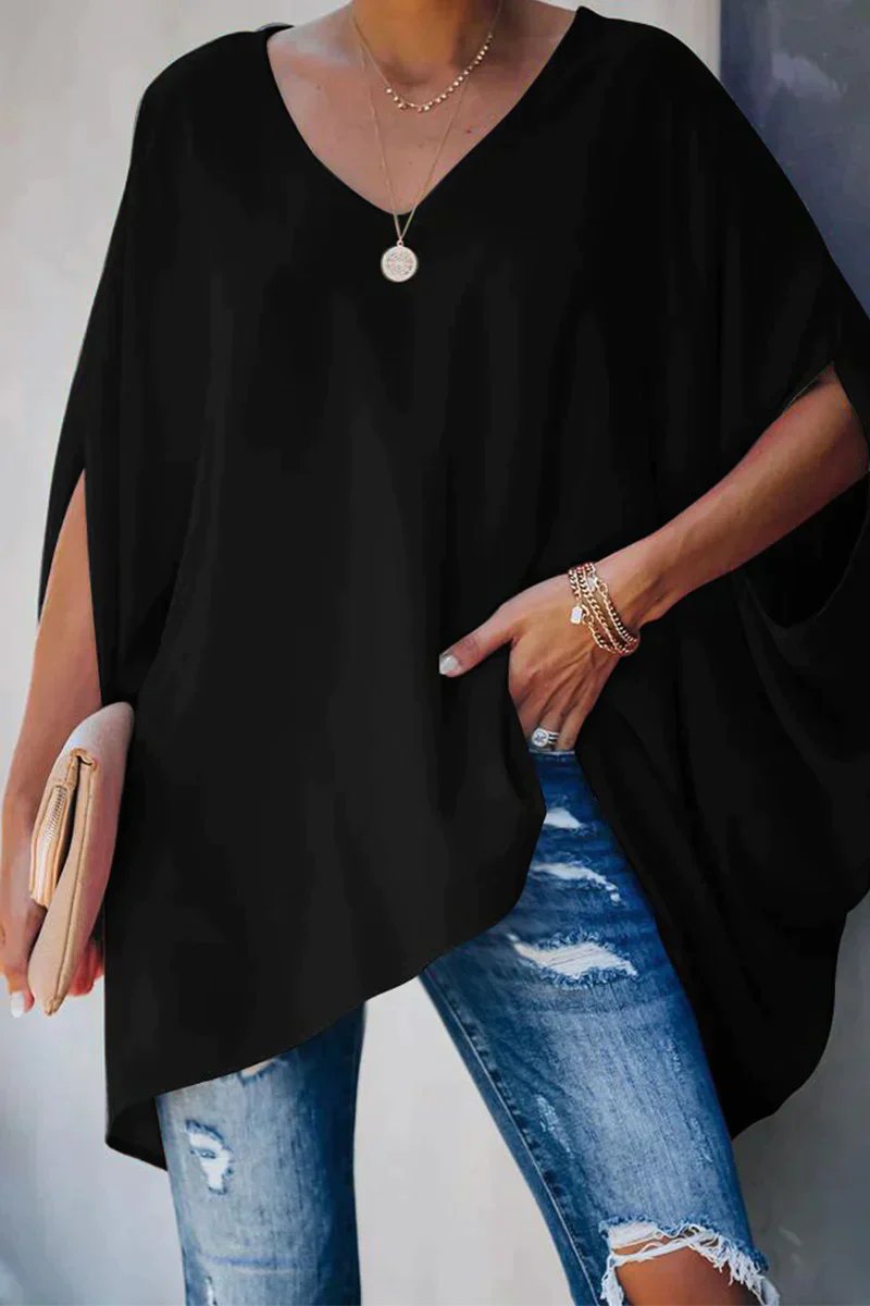 Women oversized tunic top with batwing sleeves and V-neckline, asymmetric hem