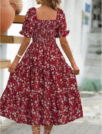 Women's floral mini dress with puff sleeves and tied waist, summer style