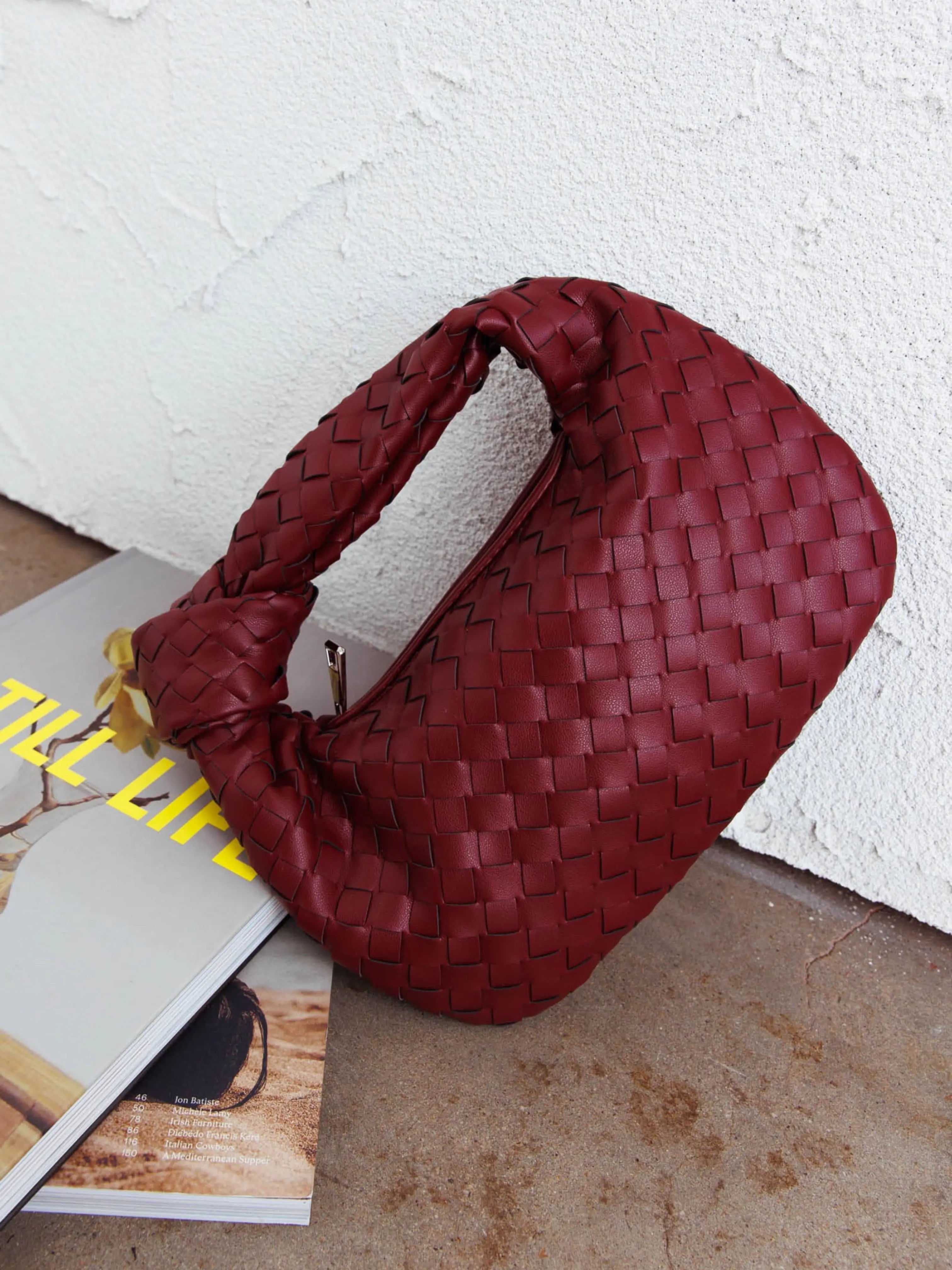 Women woven mini handbag in burgundy with button handle detail