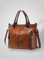 Women leather shoulder bag with magnetic snap closure and adjustable strap