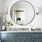 Modern wall lamp with cylindrical ribbed clear glass shade in chrome or gold finish