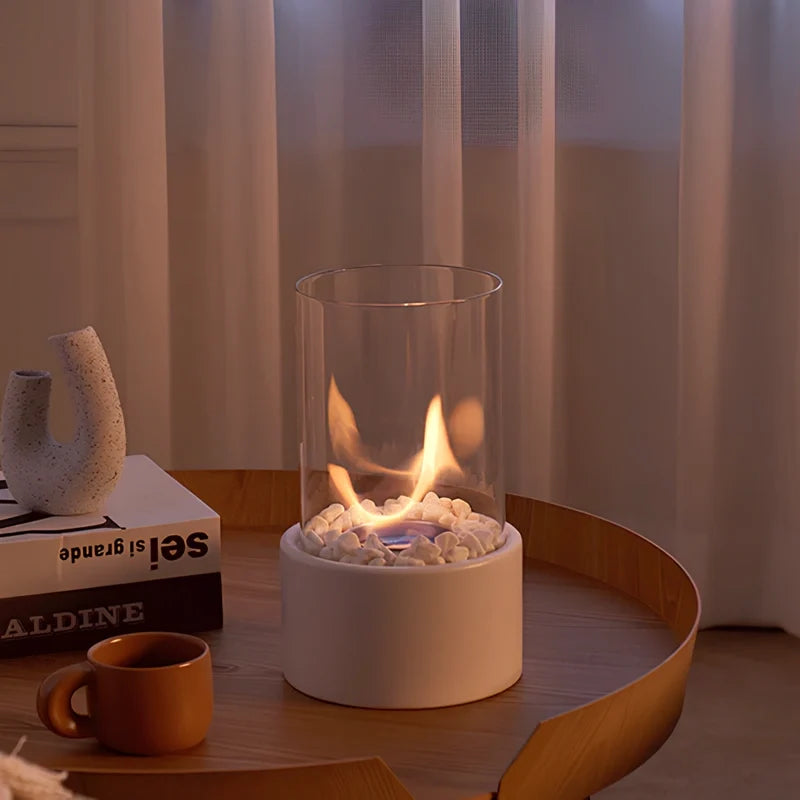 Decorative ethanol oil lamp with metal frame, glass cylinder, and decorative stones, indoor and outdoor