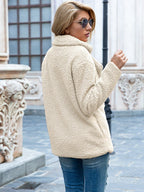 Women's mid-length coat with classic lapel collar, tailored fit outerwear