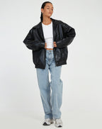 Women's oversized PU leather jacket in brown and black, relaxed fit streetwear style