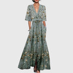 Women's spring floral dress with flared skirt and waist belt, available in red, white and green