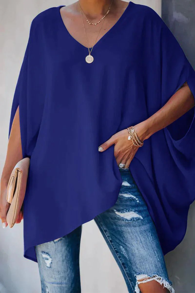Women oversized tunic top with batwing sleeves and V-neckline, asymmetric hem