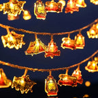 LED camping string lights with warm white tent and camper figures, battery operated
