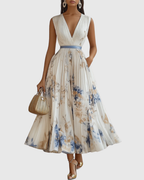 Pleated maxi dress V-neck long sleeve with ribbon-tie waist and floral pattern