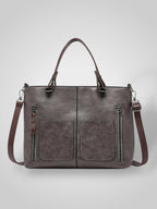 Women leather shoulder bag with magnetic snap closure and adjustable strap