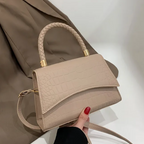 Women's PU leather handbag with top handle and crossbody strap, available in black and khaki