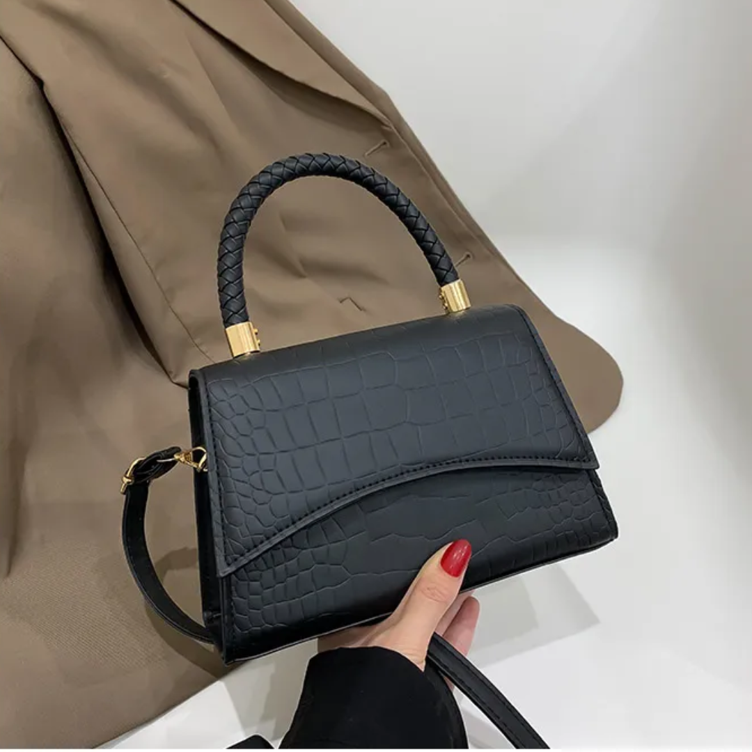 Women's PU leather handbag with top handle and crossbody strap, available in black and khaki