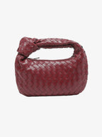 Women woven mini handbag in burgundy with button handle detail