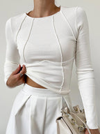 Women's slim fit ribbed top with flattering seam detail, lightweight and breathable